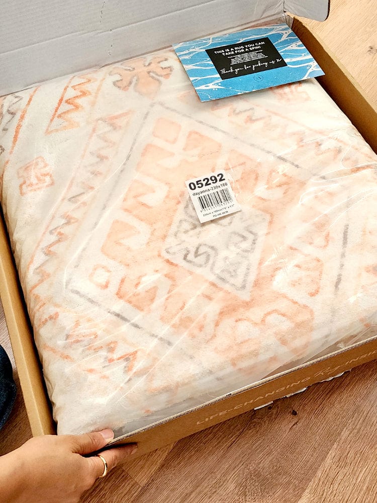 Dayanna Orange and Cream Tribal Washable Rug